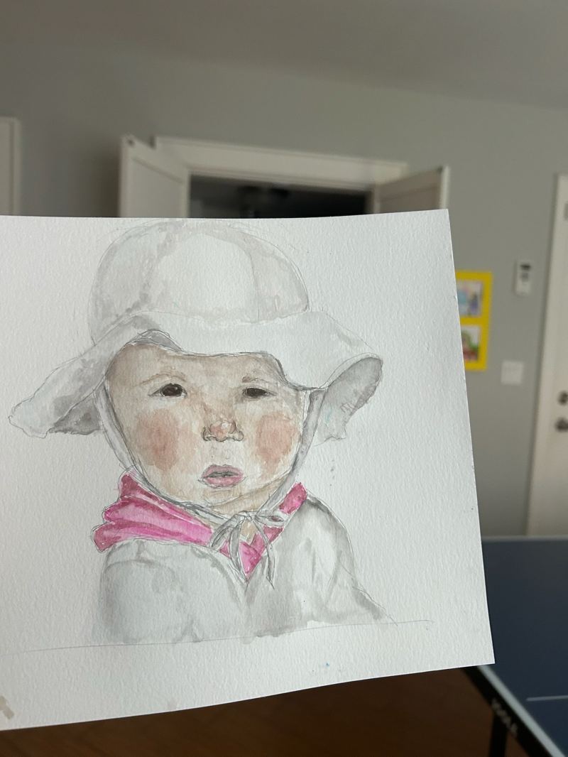 Watercolor portrait of a baby in a bonnet