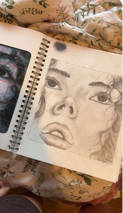 Close-up pencil sketch of a face