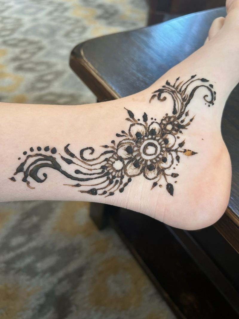 Henna design on the top of a foot
